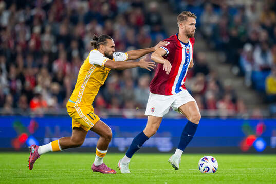 Virgiliu Postolachi of Moldova and Kristoffer Ajer of Norway