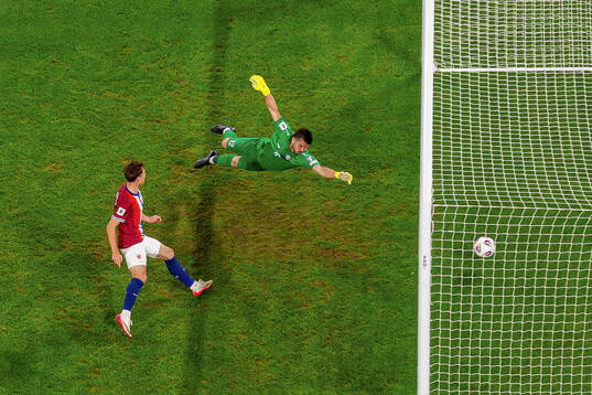 Felix Horn Myhre of Norway scores the 1-0 goal behind