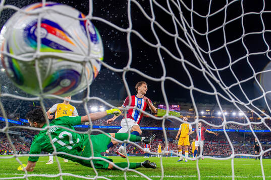 Felix Horn Myhre of Norway scores the 1-0 goal behind