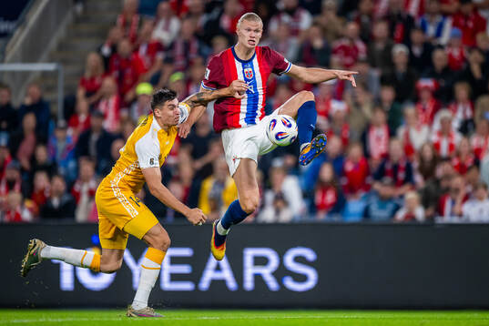 Artur Craciun of Moldova and Erling Braut Haaland of Norway