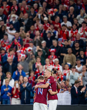Erling Braut Haaland of Norway celebrates with teammates