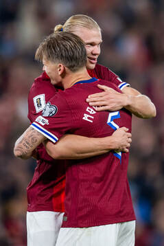 Erling Braut Haaland of Norway celebrates with teammate