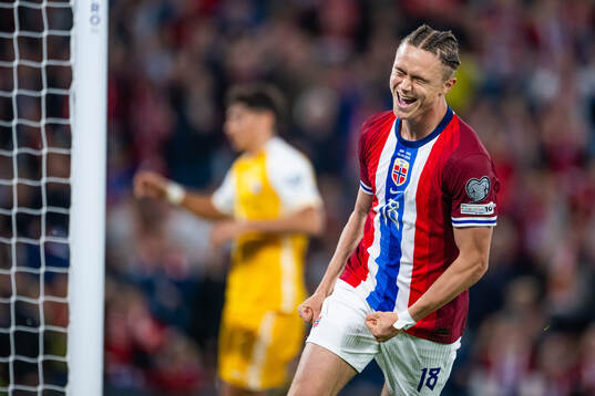 Thelo Aasgaard of Norway celebrates