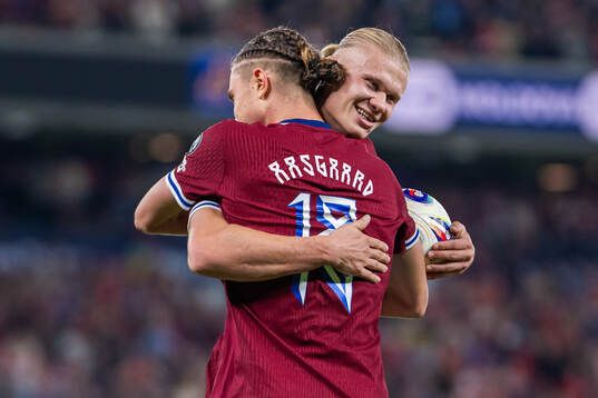 Thelo Aasgaard of Norway celebrates with teammate Erling