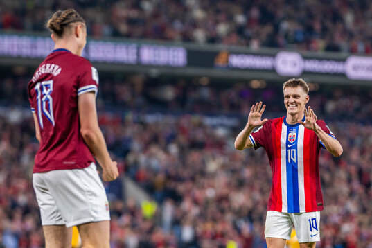 Thelo Aasgaard of Norway celebrates with teammate Martin