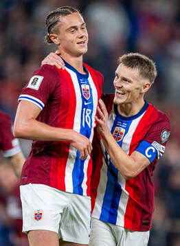 Thelo Aasgaard of Norway celebrates with teammate Martin