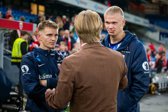 Martin Ødegaard and Erling Braut Haaland of Norway speaks