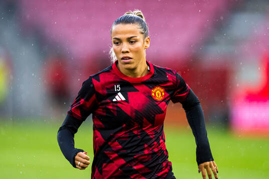 Celin Bizet Ildhusøy of Manchester United warms up