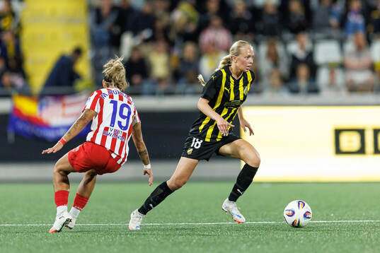 Macarena Portales of Atletico Madrid and Lisa Löwing of