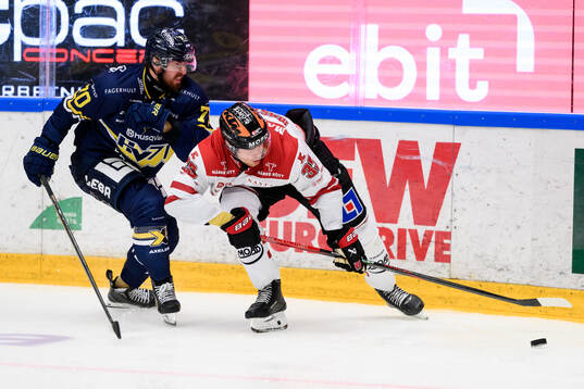 Örebros Christopher Mastomäki och HV71s Lukas Rousek