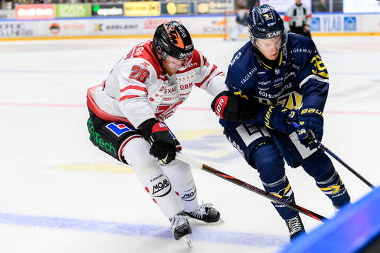 Örebros Linus Arnesson och HV71s Martin Johnsen