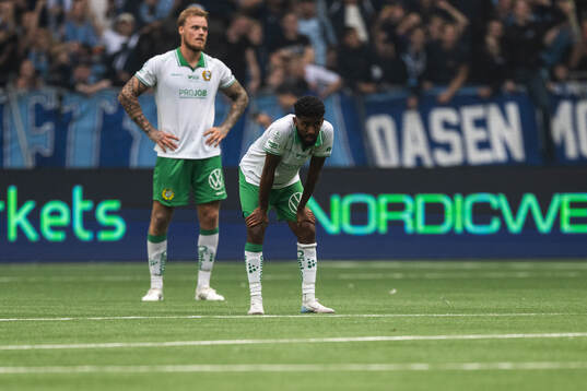 Hammarbys Victor Eriksson och Tesfaldet Tekie deppar