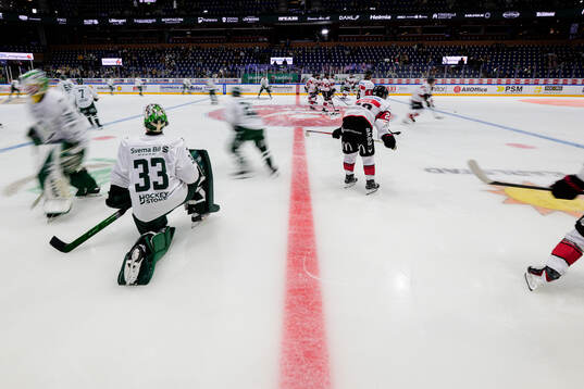 Spelare värmningen