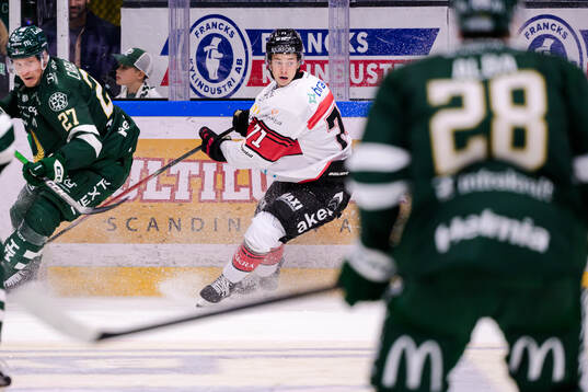 Färjestads Gabriel Carlsson och Malmö Redhawks Isac