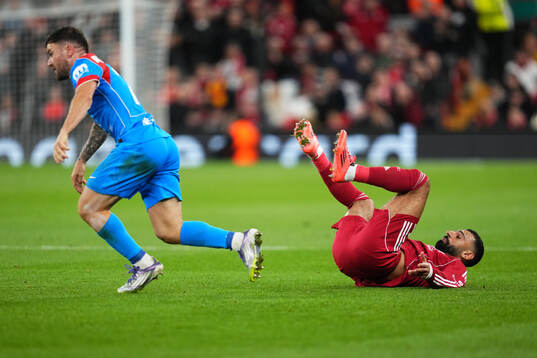 Javier Galán of Atletico Madrid and Mohammed Salah of