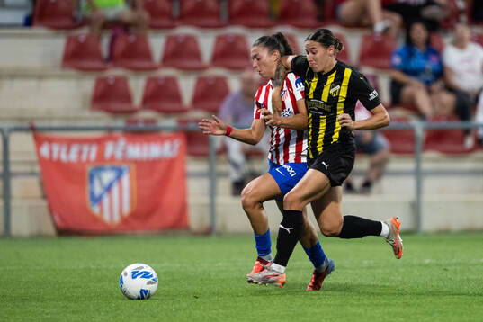 Silvia Lloris of Atletico Madrid and Tabby Tindell of