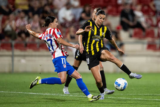 Julia Bartel of Atletico Madrid and Helena Sampaio of
