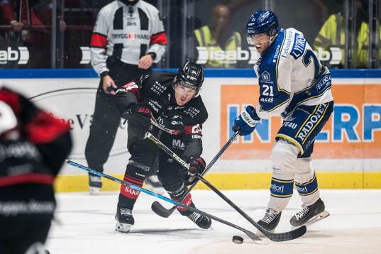Malmö Redhawks Filip Björkman och Leksands Joonas Lyytinen
