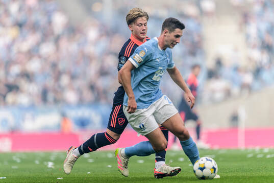 Djurgårdens Matias Siltanen och Malmö FFs Lasse Berg