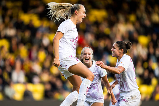 Lauren Alison Davidson of Brann celebrates