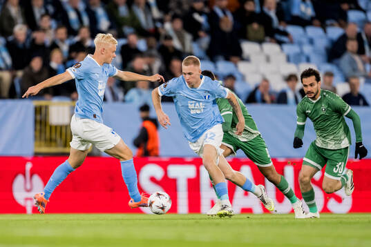 Otto Rosengren and Daniel Gudjohnsen of Malmö FF