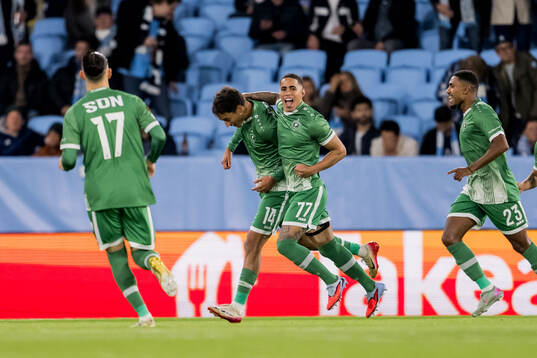 Petar Stanic and Erick Marcus of Ludogorets celebrate