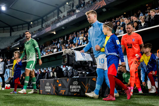 Anders Christiansen and goalkeeper Robin Olsen  of Malmö FF