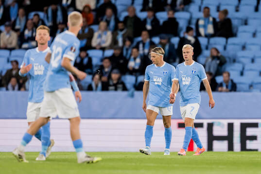 Jens Stryger Larsen and Otto Rosengren of Malmö FF look