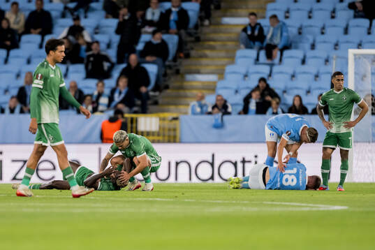 Yves Erick Bile of Ludogorets and Pontus Jansson of Malmö