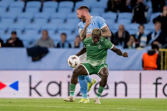 Pontus Jansson of Malmö FF and Yves Erick Bile of