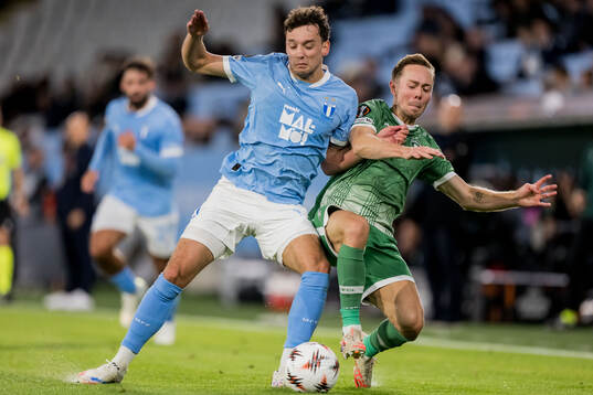 Colin Rösler of Malmö FF and Joel Andersson of Ludogorets