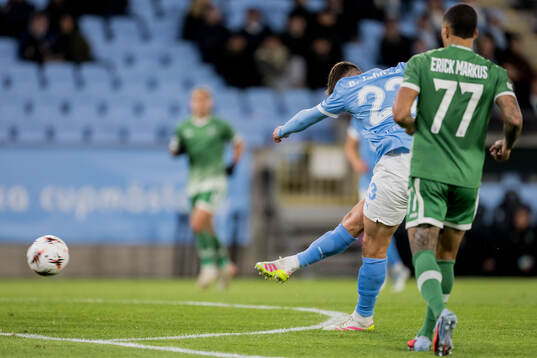 Lasse Berg Johnsen of Malmö FF scores 1-2