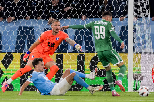 Goalkeeper Robin Olsen of Malmö FF and Stanislav Ivanov of