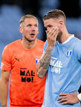 Goalkeeper Robin Olsen and Pontus Jansson looks dejected