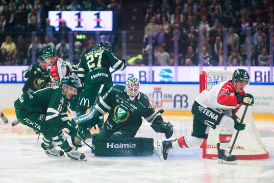 Färjestads Joakim Nygård och målvakt Emil Larmi