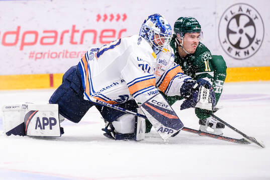 Växjös målvakt Adam Åhman och Färjestads Joakim Nygård