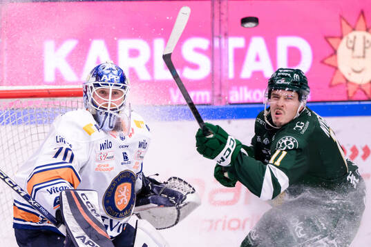 Växjös målvakt Adam Åhman och Färjestads Joakim Nygård
