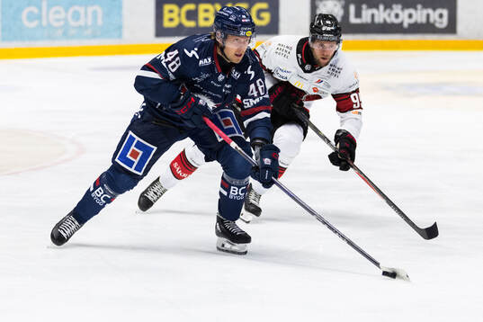 Linköpings Mikko Kokkonen och Malmö Redhawks Carl Persson