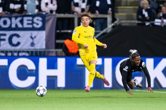 Patrick Berg of Bodø/Glimt and Wilson Odobert of Tottenham