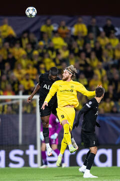 Kevin Danso of Tottenham Hotspur and Kasper Høgh of
