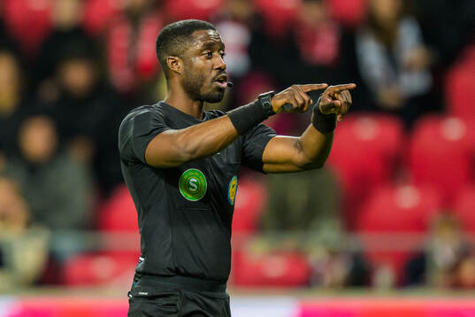 Domare Fredrik Oppong