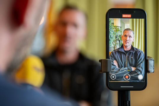 Goalkeeper Robin Olsen of Malmö FF is being interviewed at