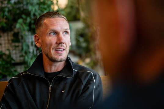 Goalkeeper Robin Olsen of Malmö FF is being interviewed at