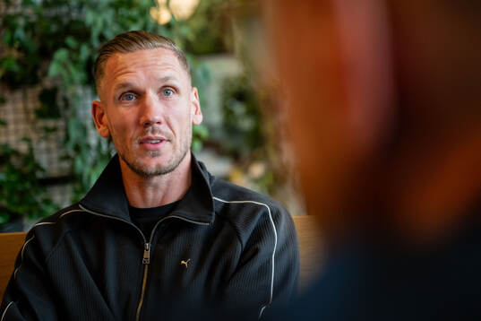 Goalkeeper Robin Olsen of Malmö FF is being interviewed at