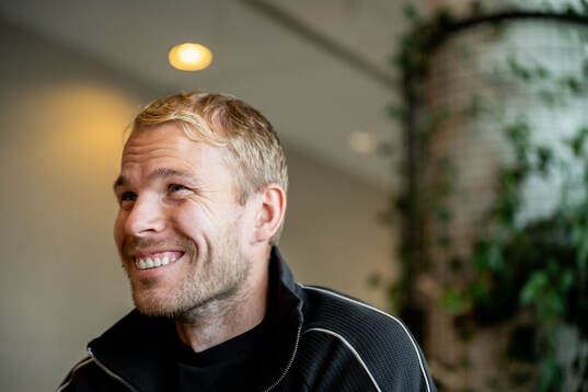 Oscar Lewicki of Malmö FF is being interviewed at a press