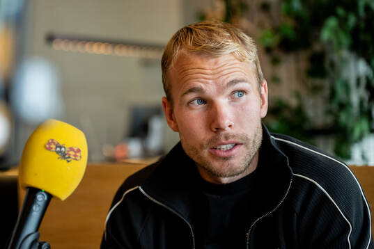 Oscar Lewicki of Malmö FF is being interviewed at a press