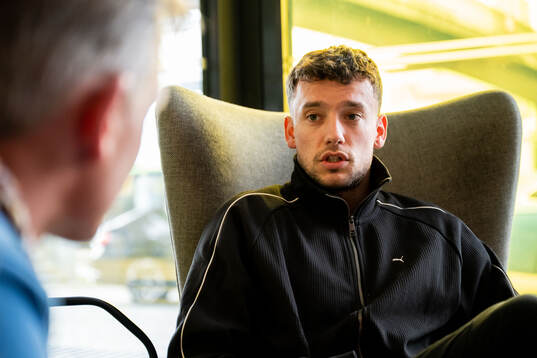 Colin Rösler of Malmö FF is being interviewed at a press