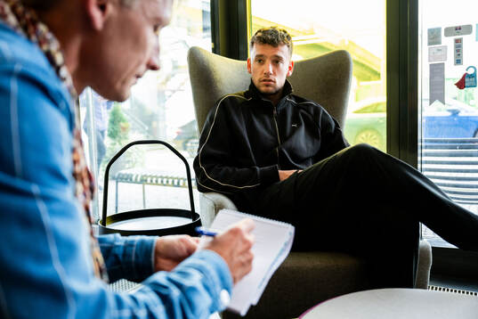 Colin Rösler of Malmö FF is being interviewed at a press