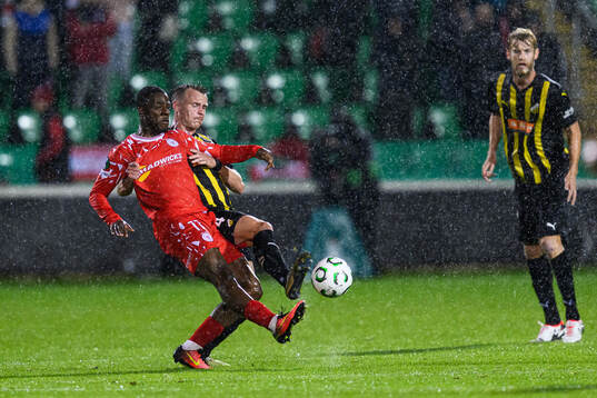 Ademipo Odubeko of Shelbourne FC and Marius Lode of Häcken