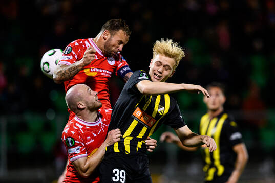 Patrick Barrett of Shelbourne FC and Isak Brusberg of